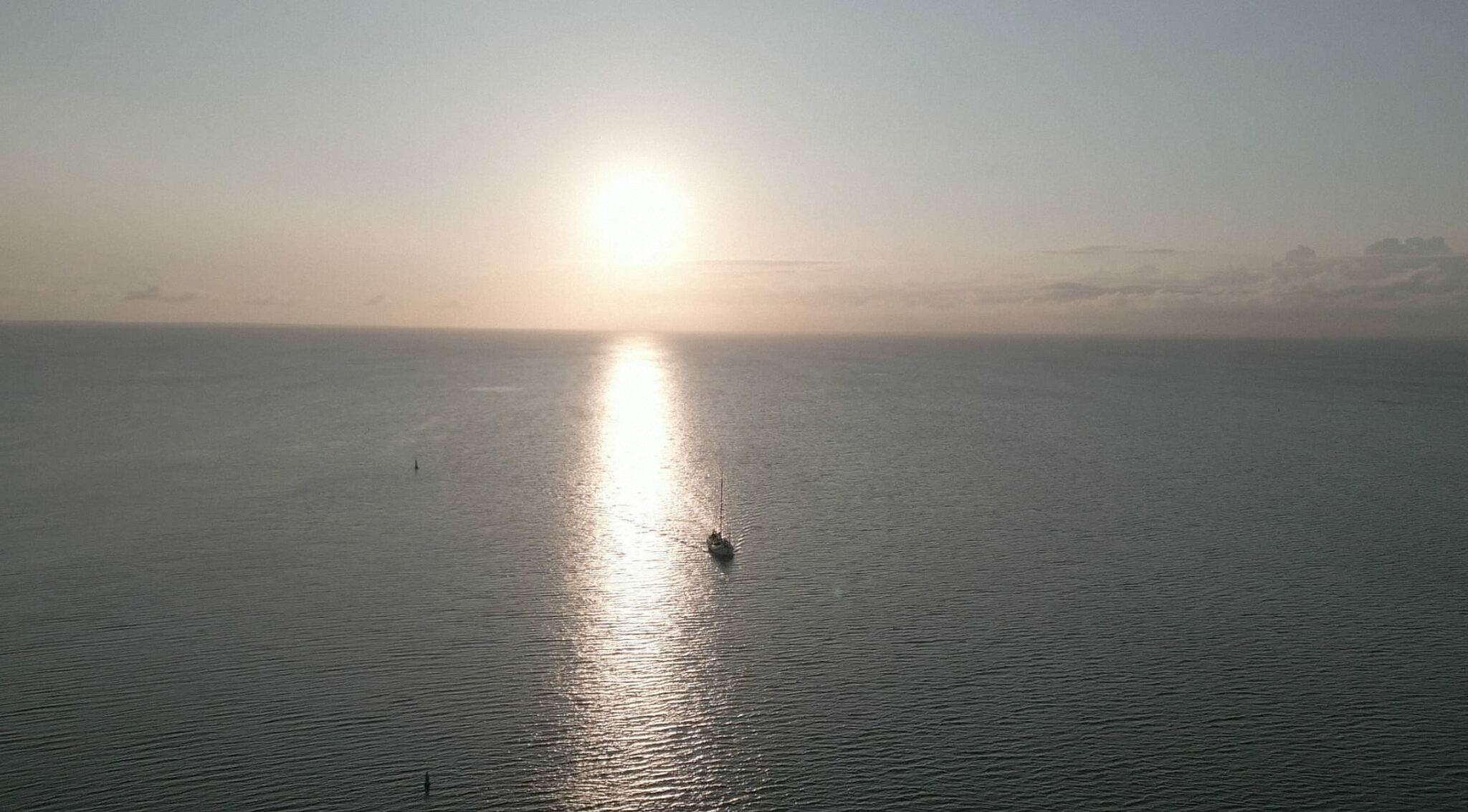 Boat on ocean for us who remain